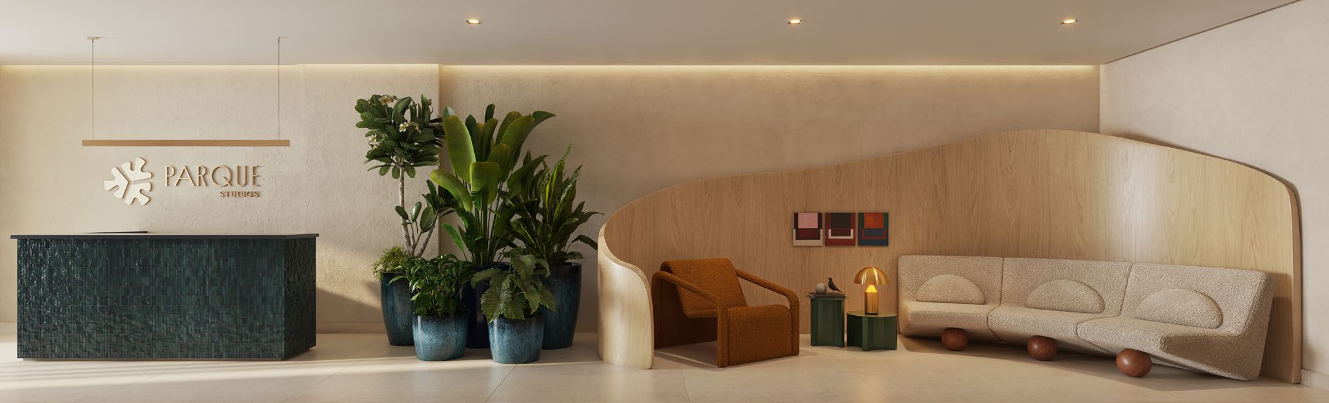 Portaria decorada do Parque Studios, com recepção e vegetação