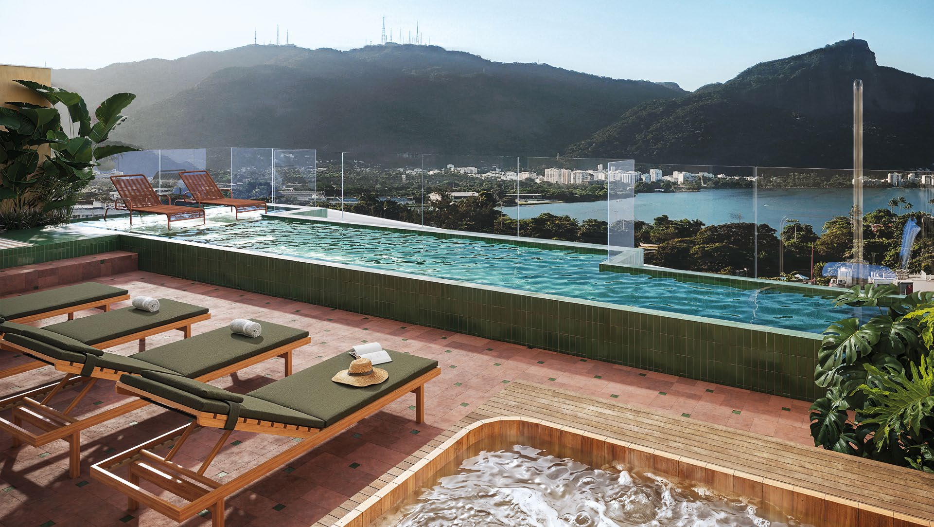 Piscina do rooftop do Parque Studios, com vista para a Lagoa Rodrigo de Freitas e o Cristo Redentor